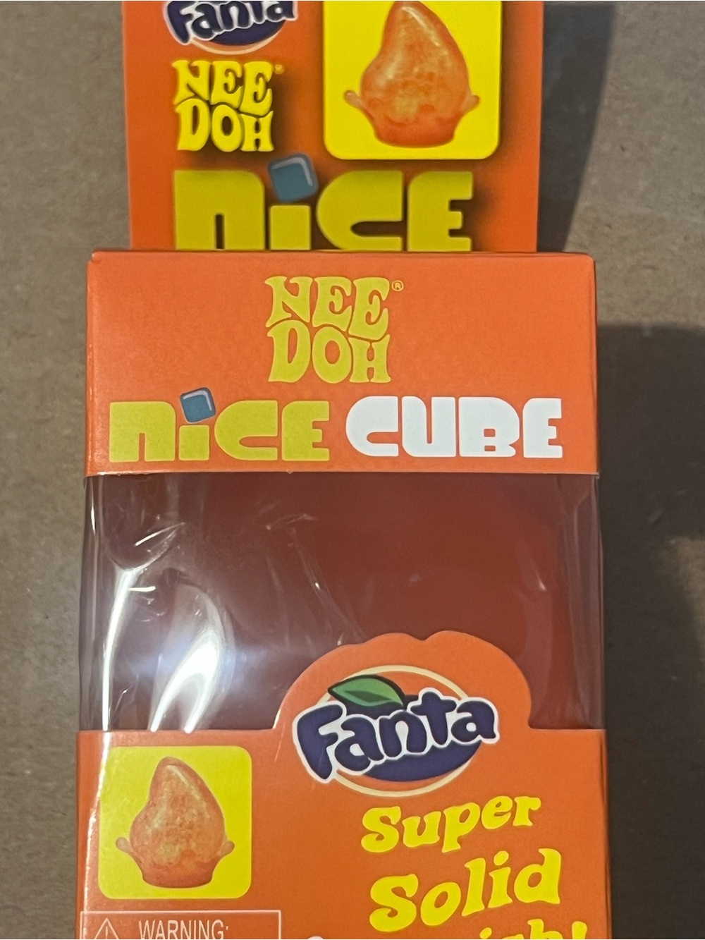 Nee Doh Fanta NiCE Cube Drop Super Solid Orange Toy -